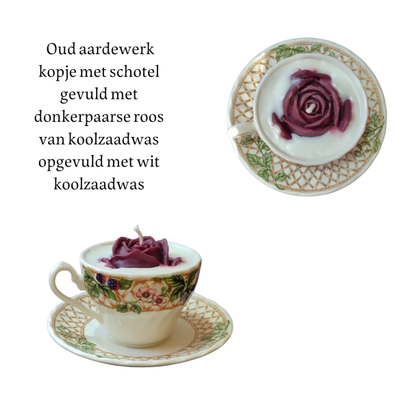 Oud aardewerk kopje, motief van bessen, blaadjes en bloemen met schotel gevuld met donkerpaarse roos van koolzaadwas opgevuld met wit koolzaadwas